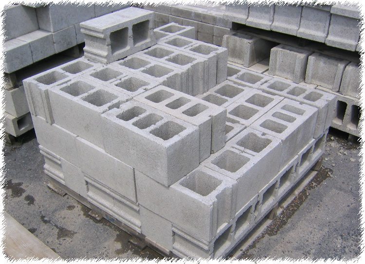 A pile of concrete blocks sitting on top of each other.
