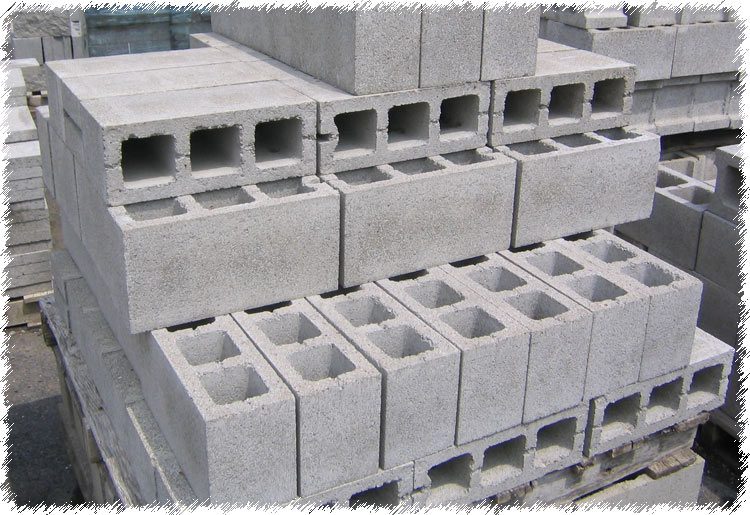 A pile of concrete blocks stacked on top of each other.