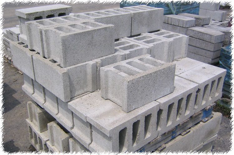 A pile of concrete blocks stacked on top of each other.