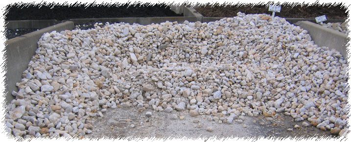A pile of gravel on the ground.