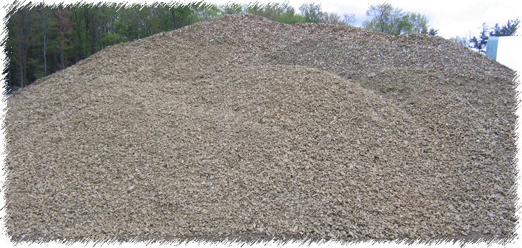 A pile of dirt on top of a hill.