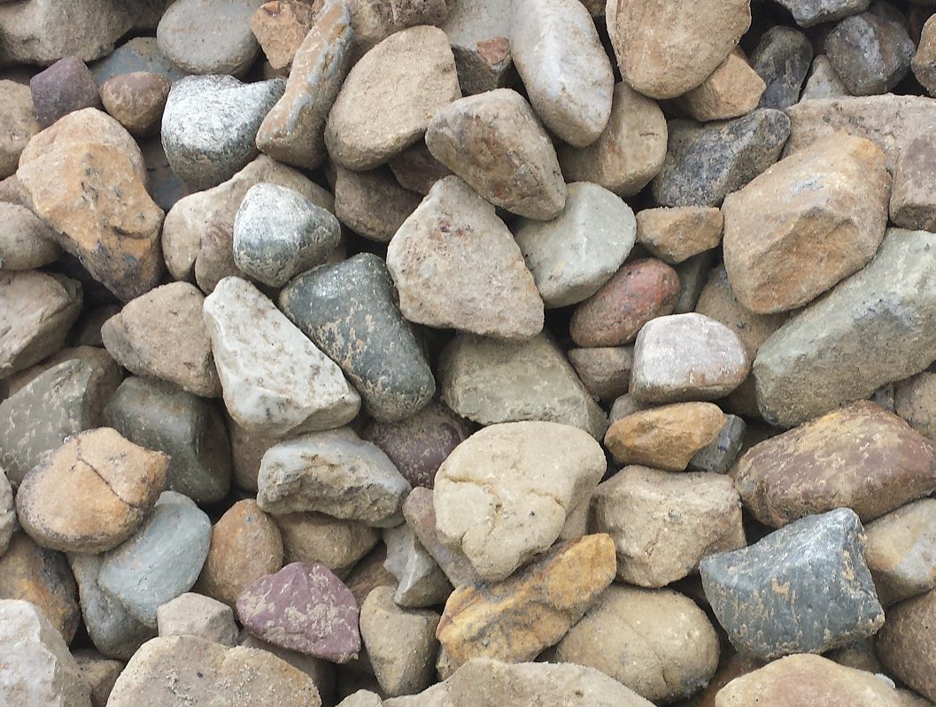 A pile of rocks that are all different colors.
