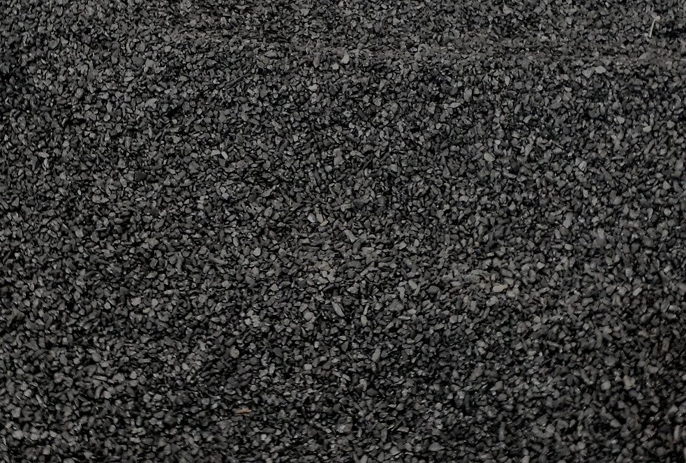 A close up of the black carpet material